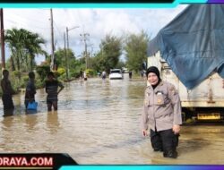 Jalan Raya Sumenep-Pamekasan Tergenang Banjir Akibat Hujan Deras, Polres Sumenep Lakukan Pengalihan Arus dan Bantu Evakuasi
