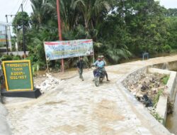 Tugu TMMD, ke-124 Kodim 1002/HST di Pengambau Hilir Luar Berdiri Kokoh