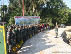 Dansatgas TMMD ke-124 Kodim 1002/HST Pimpin Apel Pagi di Titik Nol Pembangunan Jalan Haruyan