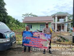 Personel Polsek Kahayan Kuala, sambangi warga dan Memberikan himbauan Tentang Larangan Membakar hutan dan lahan