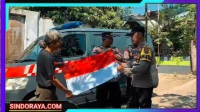 Polres Probolinggo Bagikan Ribuan Bendera Merah Putih Untuk Warga, Bangkitkan Semangat Kemerdekaan RI ke – 80