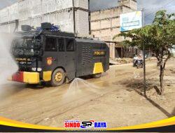 Water Cannon Disemprotkan di Jalan Lintas Aceh Selatan, Polri Minimalisir Debu Pasca Banjir