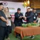 Pelantikan pengurus KWI Jatim 2026–2027 di Surabaya dengan prosesi pemotongan tumpeng