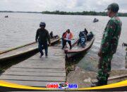 Pastikan Keamanan Masyarakat Saat Lebaran Anggota Koramil 07/Tlk Laksanakan Pengamanan Transportasi Air di Wilayah Binaan