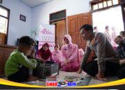 Hari Jadi YKB ke-46, Kapolres Bojonegoro Beri Hadiah Laptop Bocah Jago Perbaiki Elektronik