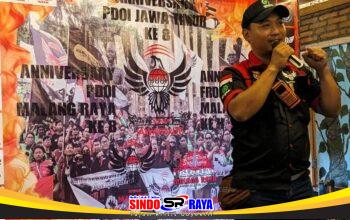 Tito Ahmad Presidium GRANAT Jatim Berbicara di Depan Banner Aksi