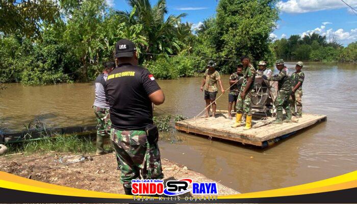 Pengecoran Selesai, Mesin Molen Cor Diseberangkan Kembali ke Tepi Jembatan Garuda Desa Handil Labuan Amas