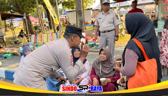 Pojok Kamtibmas Polres Ngawi Hadir di Pasar Krompol Ajak Warga Jaga Kamtibmas