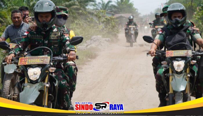 Gunakan Sepeda Motor, Dansatgas TMMD Ke-129 Tinjau Sasaran Fisik Penimbunan Jalan