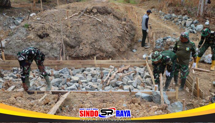 Pastikan Kokoh dan Tahan Lama, Satgas TMMD Kodim 1009/Tla Lakukan Penyusunan Batu Landasan Box Culvert
